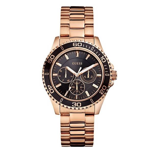 A GUESS men's watch with a rose gold-tone stainless steel bracelet and a black dial with rose gold-tone hands and index markers.
