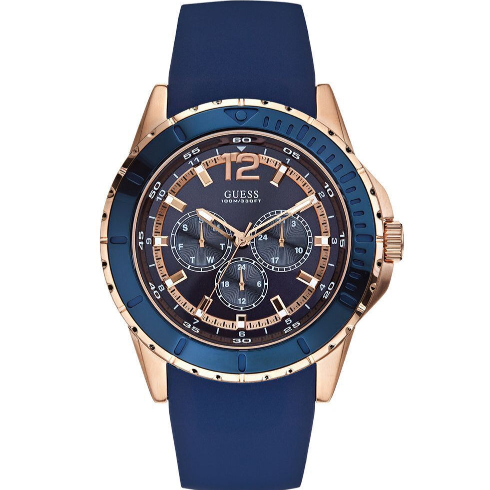 Blue watch with rose gold accents on a white background